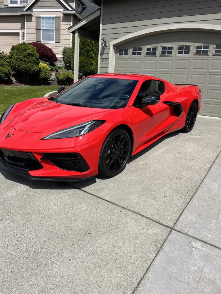 Red Corvette after professional ceramic coating in Tigard OR by Equal Autos – showing mirror-gloss finish and protection compared to traditional wax.